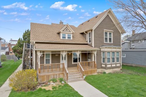 110 North 1st Street Elburn, IL 60119 - Photo 1 of 1 a front view of a house with a yard