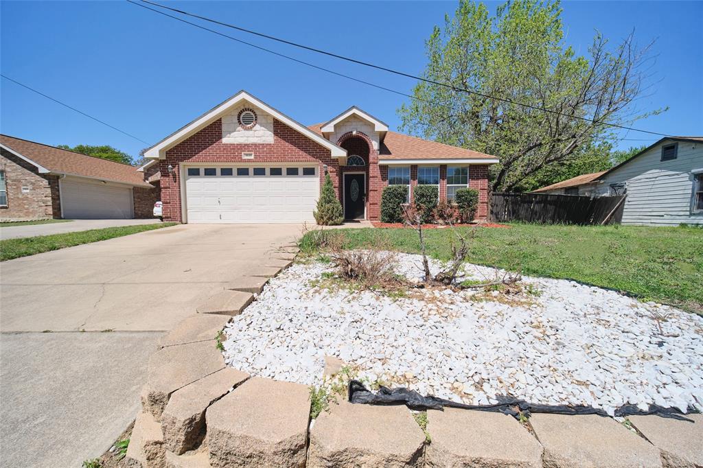 3935 Grimes Road Irving, TX 75061 - Photo 1 of 1 a front view of a house with a yard and garage