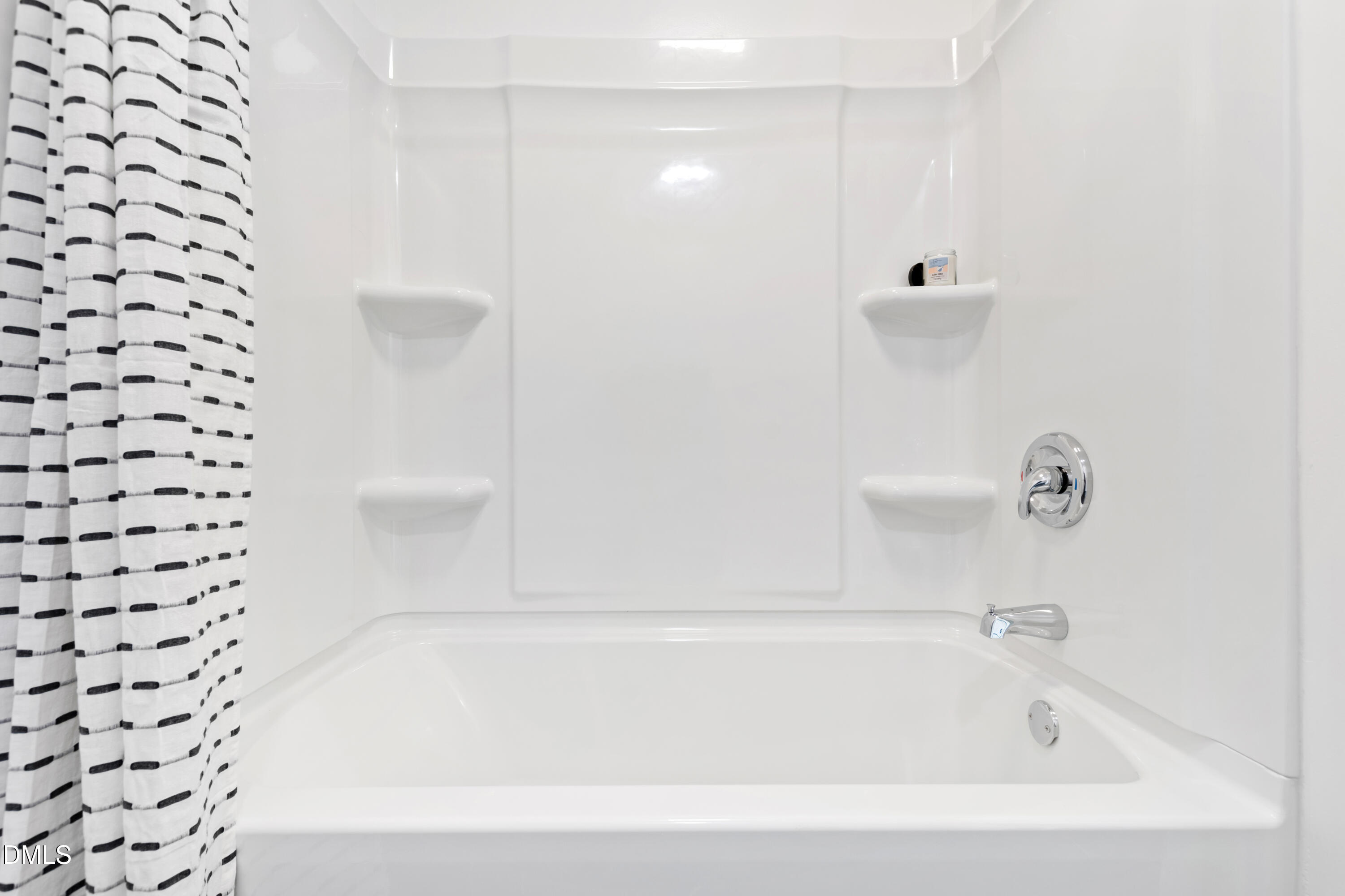 2153 Hurdle Mills Road Roxboro, NC 27574 - Photo 27 of 32 a close up of a bathtub