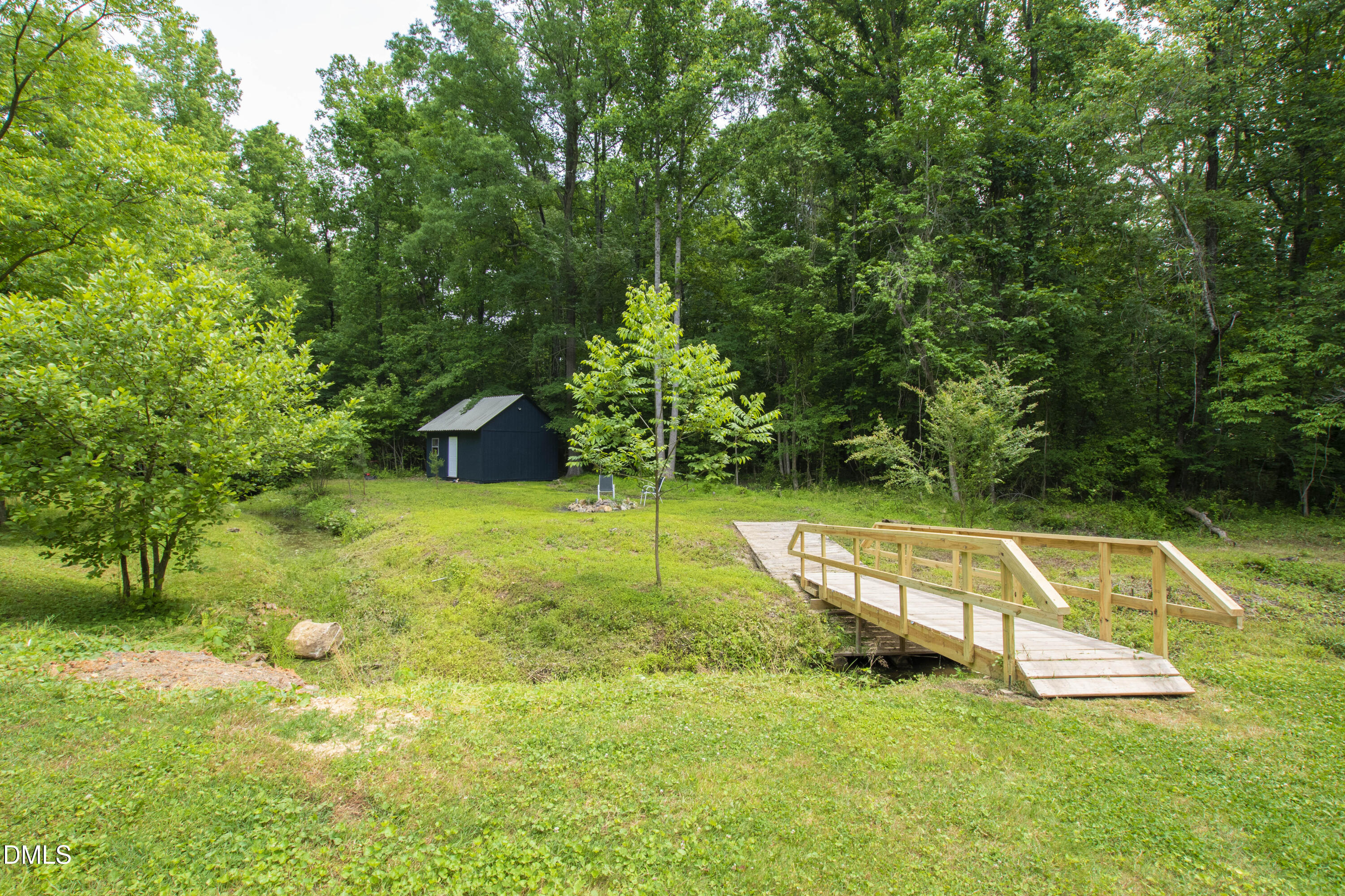 2153 Hurdle Mills Road Roxboro, NC 27574 - Photo 5 of 32 a view of a yard with swimming pool