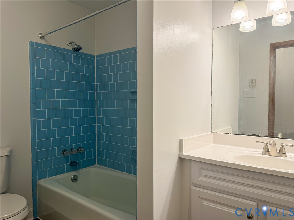 101 Lyons Avenue Colonial Heights, VA 23834 - Photo 7 of 10 a bathroom with a bathtub and a sink