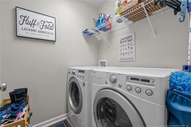 a utility room with dryer and washer