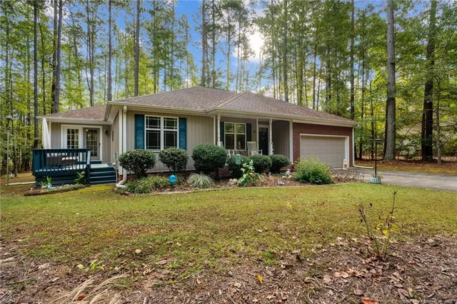 a view of a two chairs in the balcony