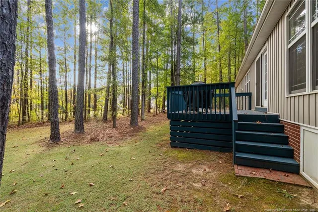 a view of balcony with wooden floor