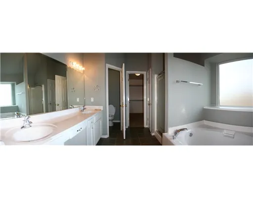 a black and white photo of a living room