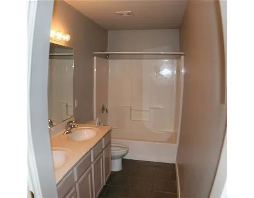 a black and white photo of a house