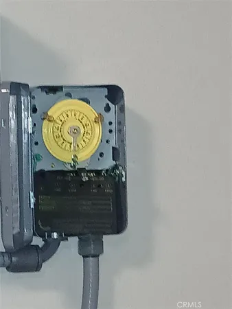 a sign on the wall with a sink