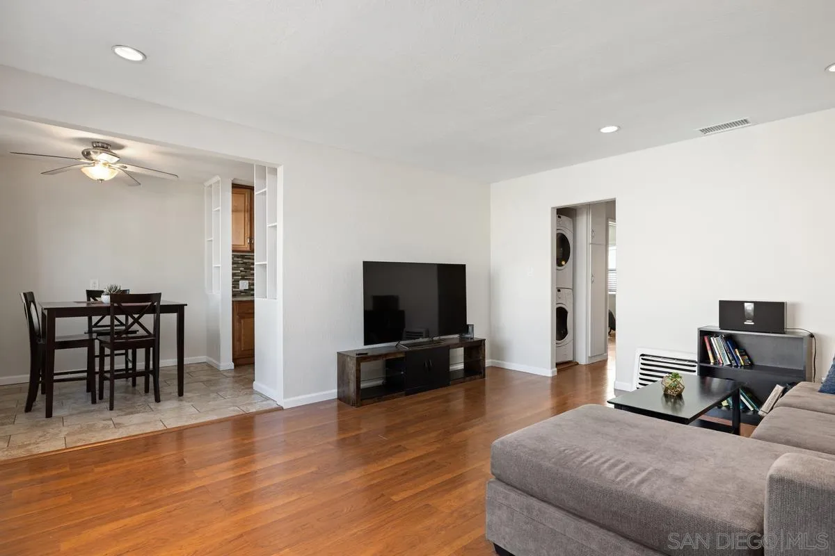 5826 Amarillo Avenue La Mesa, CA 91942 - Photo 8 of 20 a living room with furniture and a flat screen tv