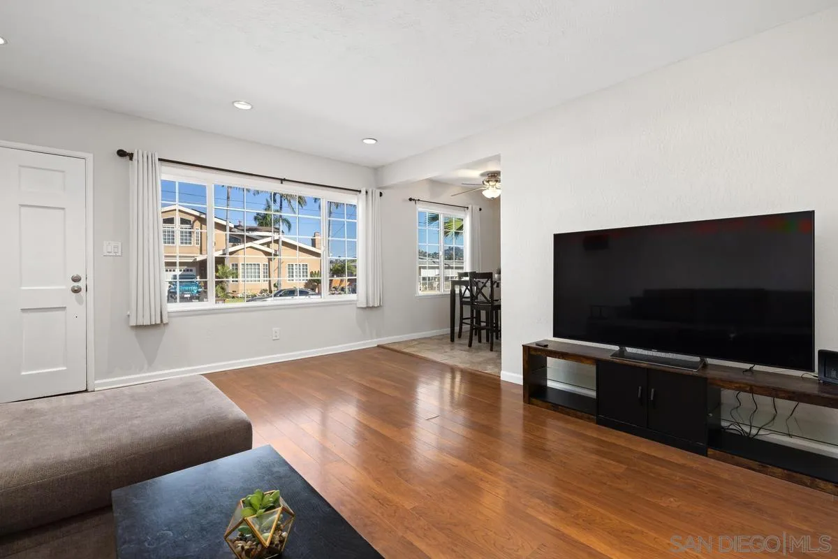 5826 Amarillo Avenue La Mesa, CA 91942 - Photo 10 of 20 a living room with furniture and a flat screen tv