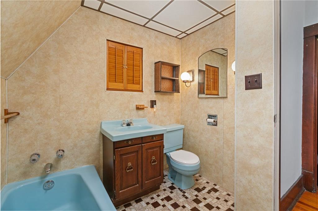 767 Fellsburg Road Belle Vernon, PA 15012 - Photo 23 of 30 a bathroom with a sink a toilet and shower