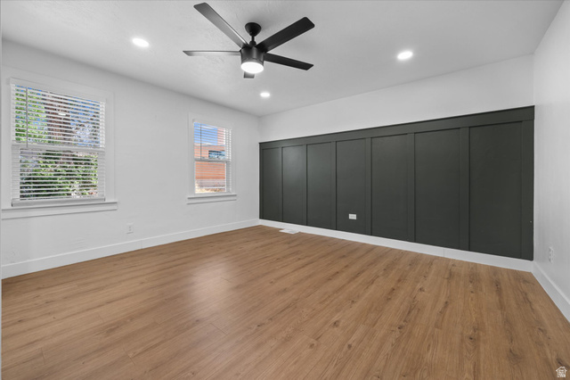 327 35th Street Ogden, UT 84401 - Photo 12 of 31 Spacious room with wood-finish flooring, recessed lighting, and a modern ceiling fan