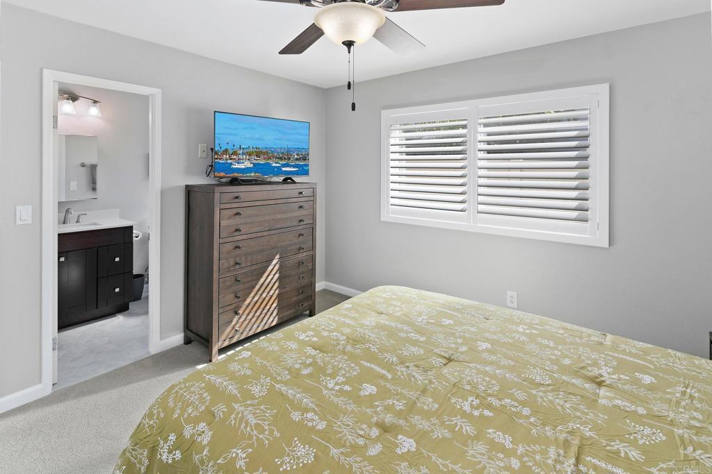 10033 Woodpark Drive Santee, CA 92071 - Photo 14 of 21 a bedroom with a bed dresser and a window