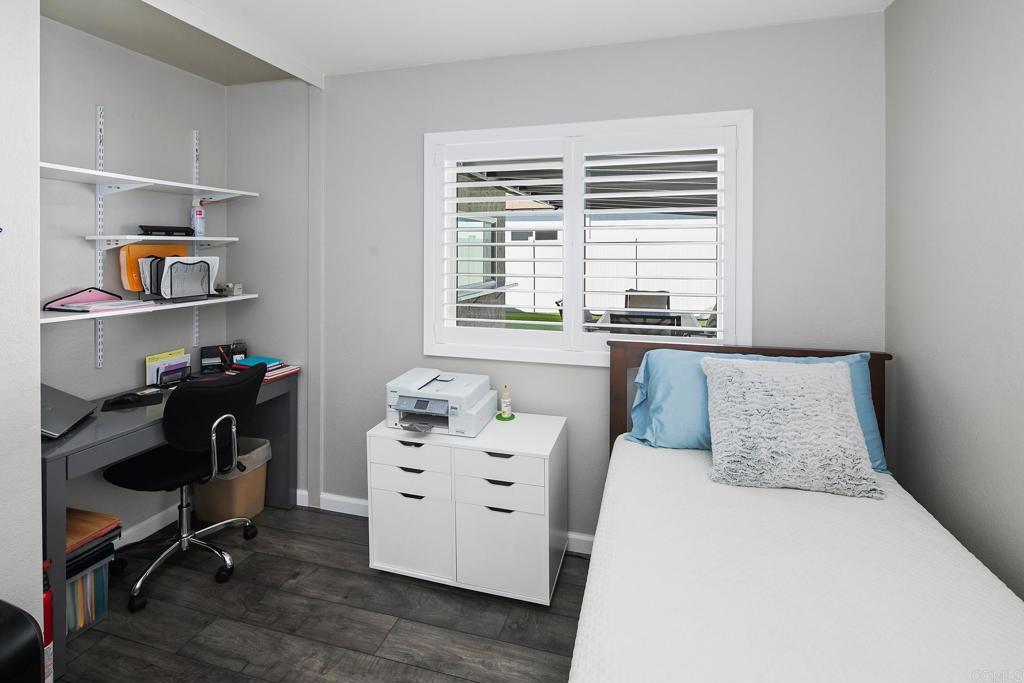10033 Woodpark Drive Santee, CA 92071 - Photo 17 of 21 a bedroom with a bed and furniture