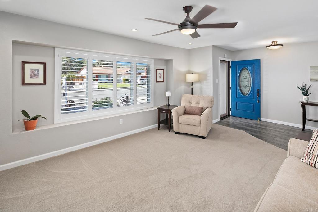 10033 Woodpark Drive Santee, CA 92071 - Photo 5 of 21 a living room with furniture and a large window