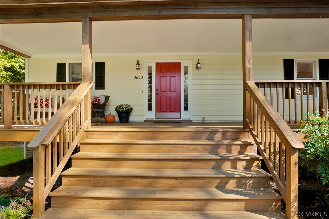 3650 Whitehall Road Sandy Hook, VA 23153 - Photo 5 of 45 a view of entryway and hall with wooden floor
