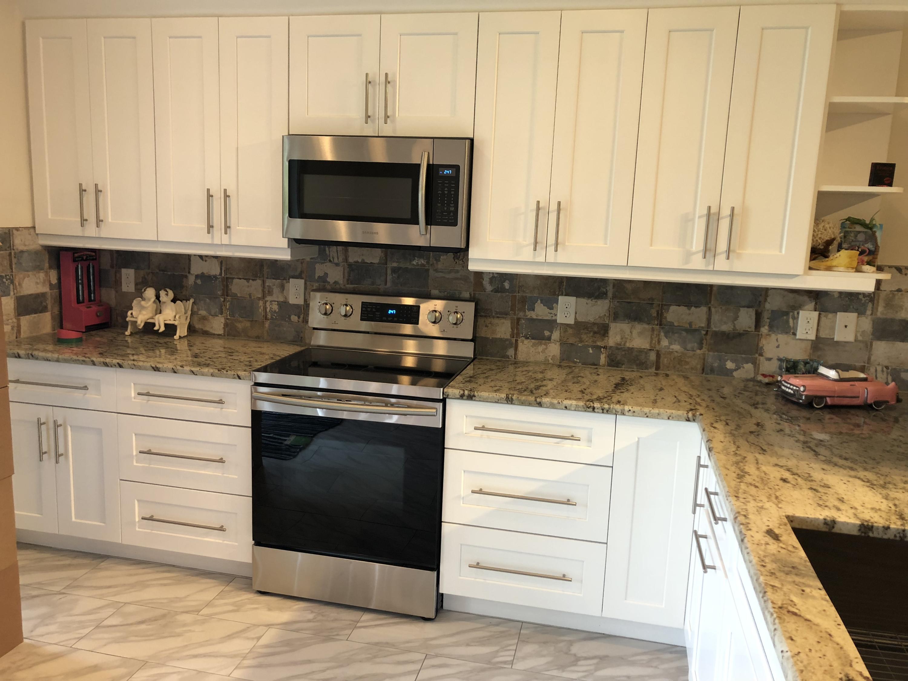 4951 Lincoln Road Delray Beach, FL 33445 - Photo 2 of 10 kitchen 1