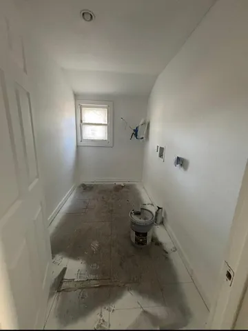 a bathroom with a sink and toilet