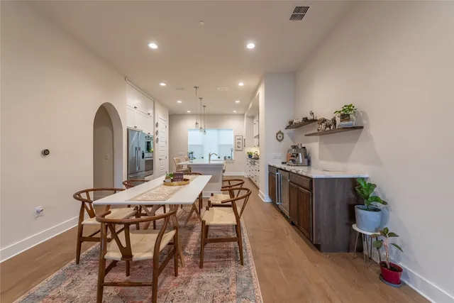 a view of a dining room with furniture