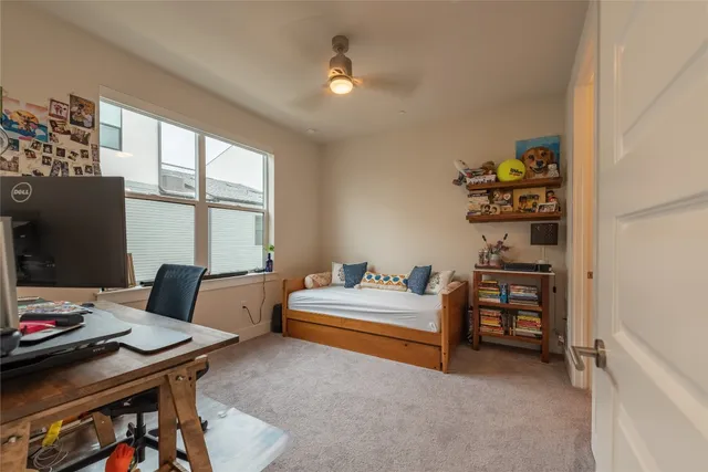 a bathroom with a double vanity sink toilet and shower