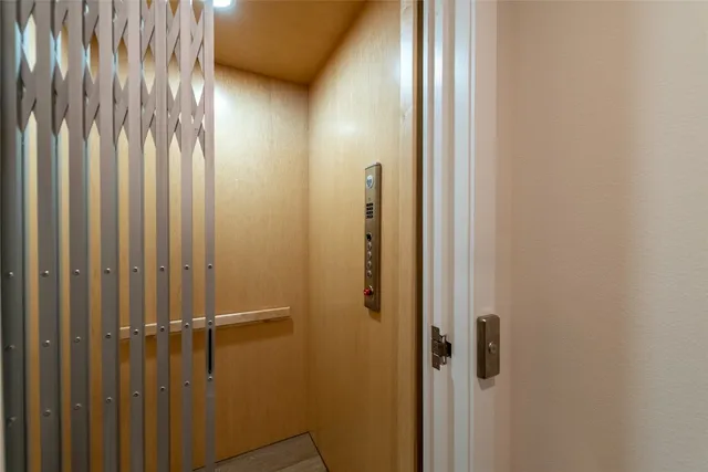 a view of elevator with hallway