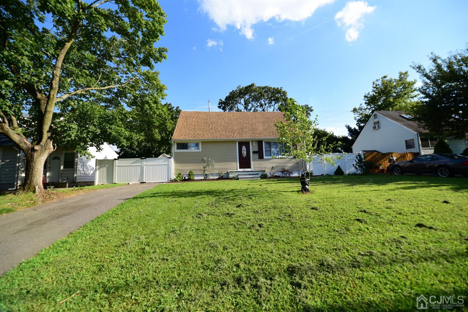 103 Tunison Road New Brunswick, NJ 08901 - Photo 2 of 30 a view of a house with a back yard