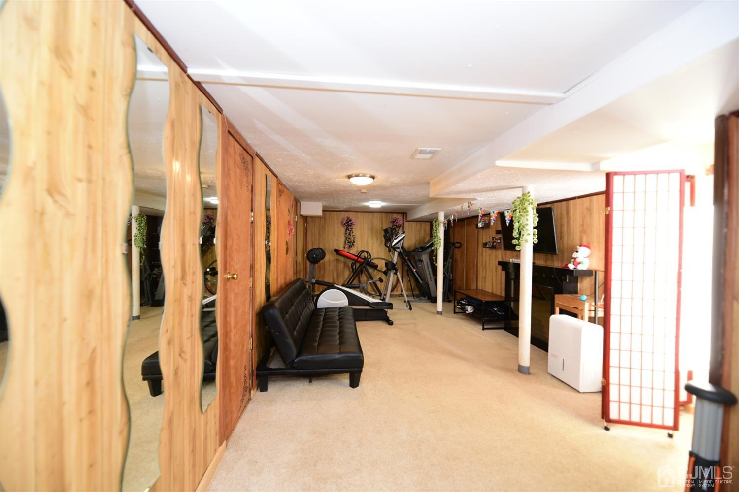 103 Tunison Road New Brunswick, NJ 08901 - Photo 20 of 30 a view of a room with gym equipment