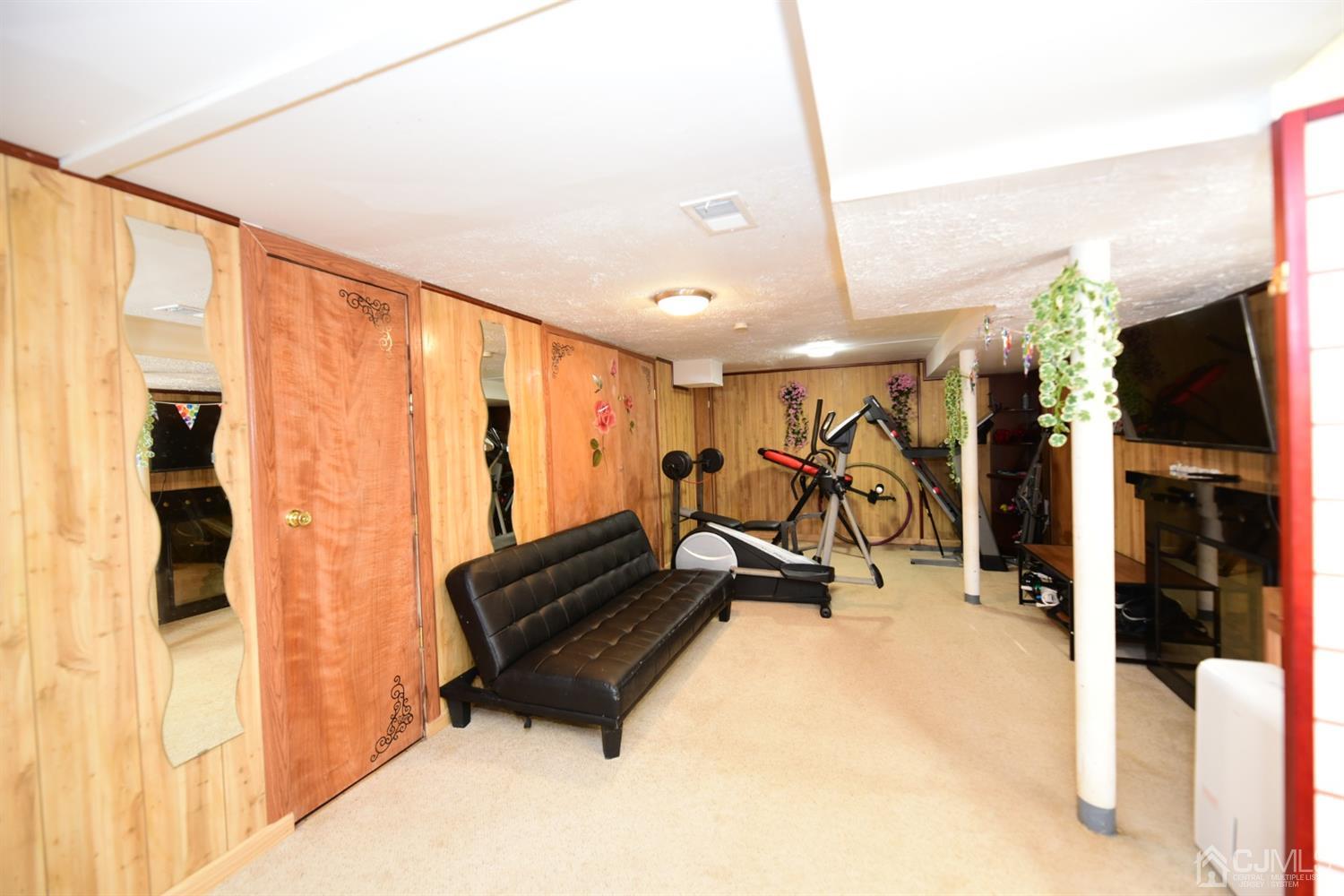 103 Tunison Road New Brunswick, NJ 08901 - Photo 21 of 30 a view of a room with gym equipment