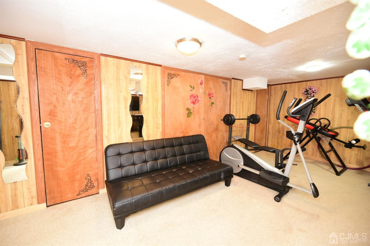 103 Tunison Road New Brunswick, NJ 08901 - Photo 23 of 30 a living room with furniture and a large window