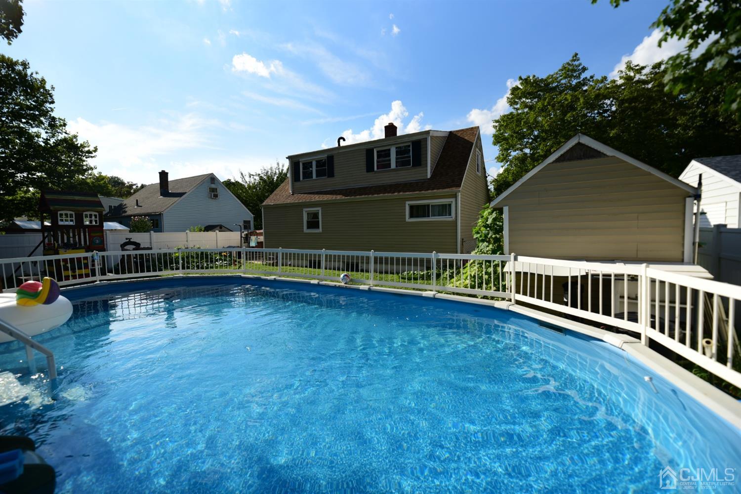 103 Tunison Road New Brunswick, NJ 08901 - Photo 29 of 30 a view of a house with wooden floor and a fence