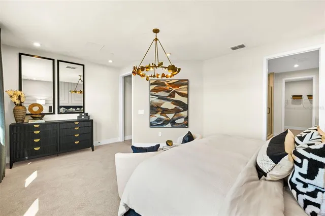 a bathroom with a shower and a sink