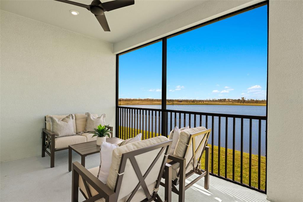 12785 Jade Empress Loop, Unit 202 Venice, FL 34293 - Photo 35 of 42 a view of a balcony with furniture