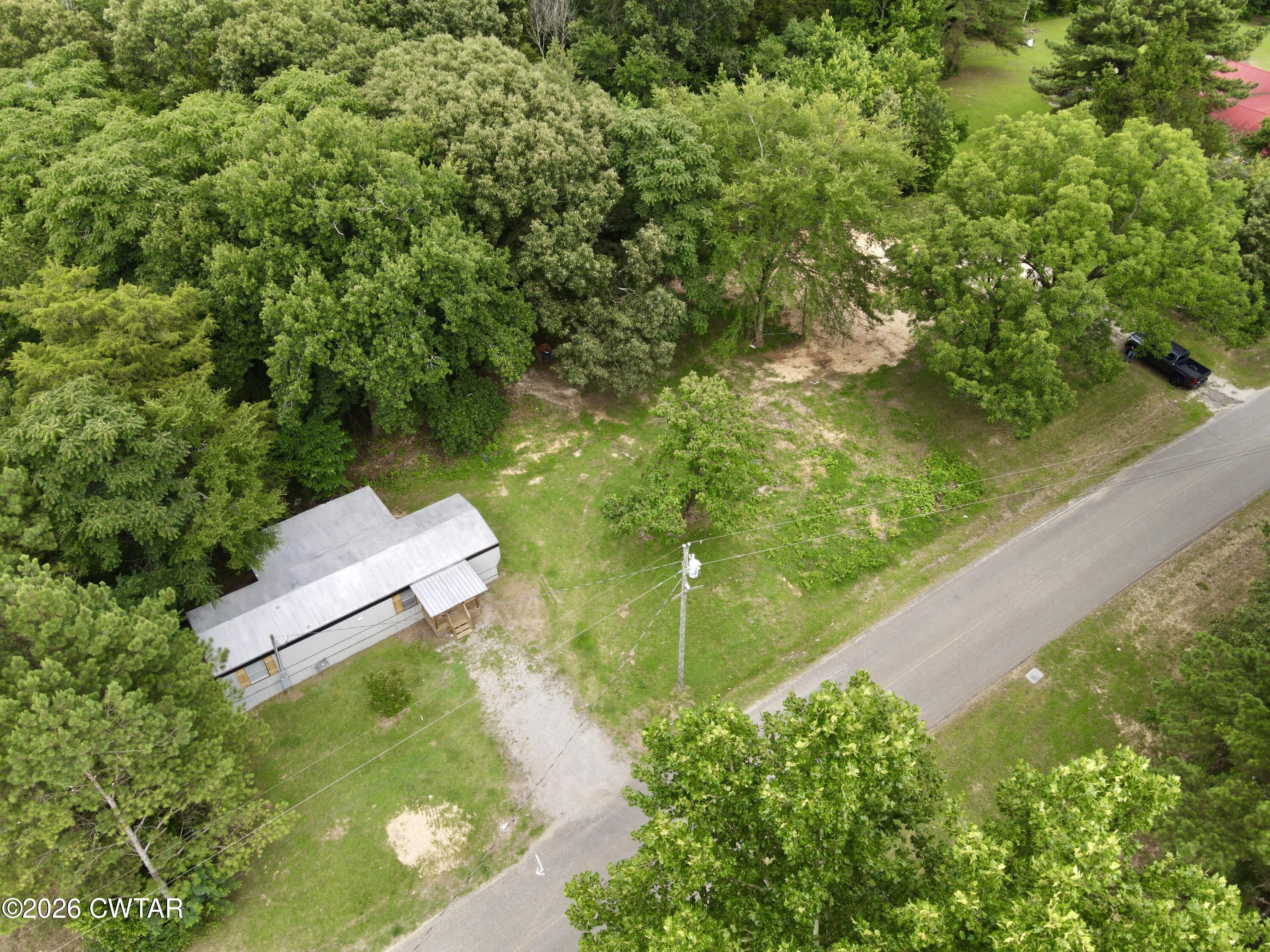 163 Walnut Grove Road Milan, TN 38358 - Photo 17 of 31 dji_fly_20260616_171124_178_178164790894