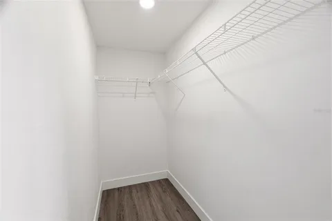 a view of a room with racks on the wall