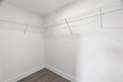 a view of a room with racks on the wall