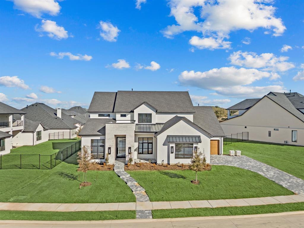 a view of house with garden and entertaining space