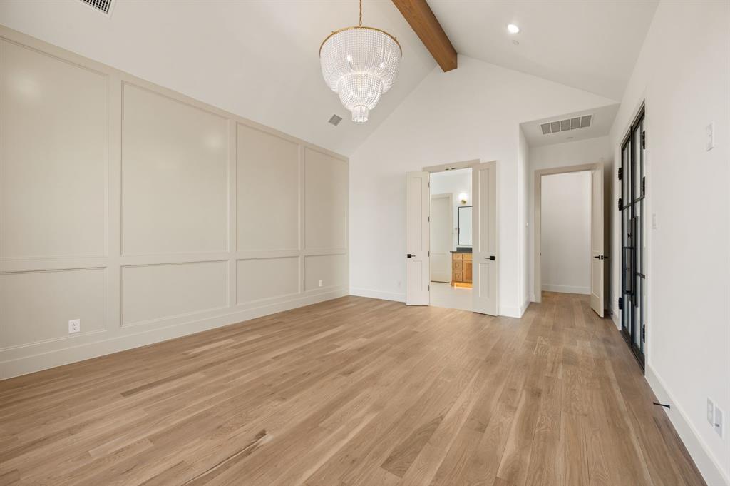 1460 Copper Point Drive Prosper, TX 75078 - Photo 20 of 40 a view of empty room with wooden floor