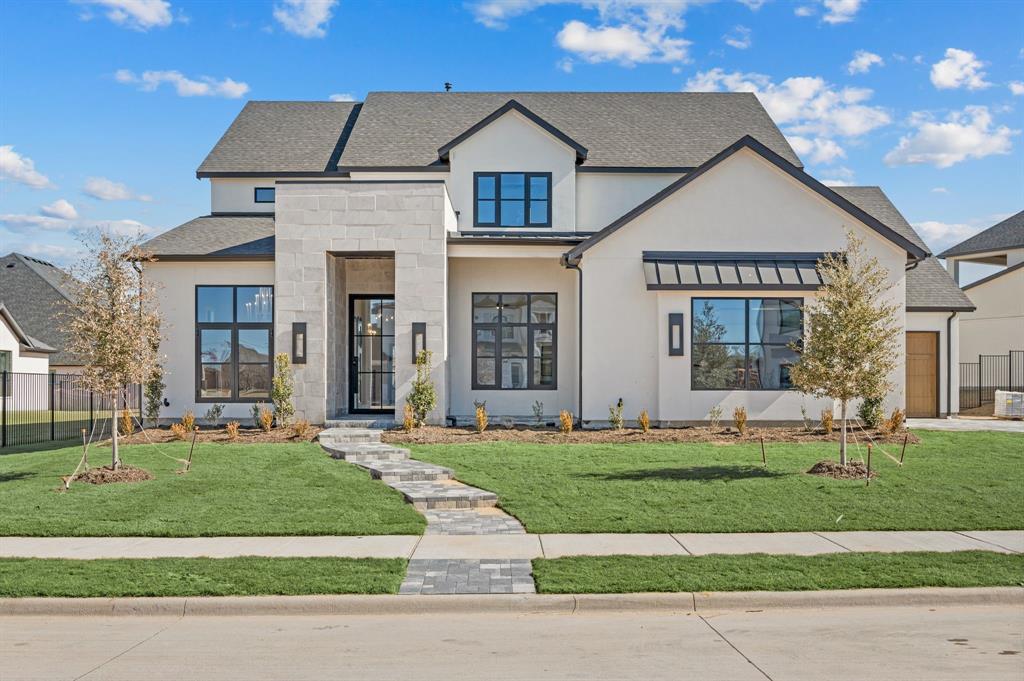 1460 Copper Point Drive Prosper, TX 75078 - Photo 3 of 40 front view of a house with a yard