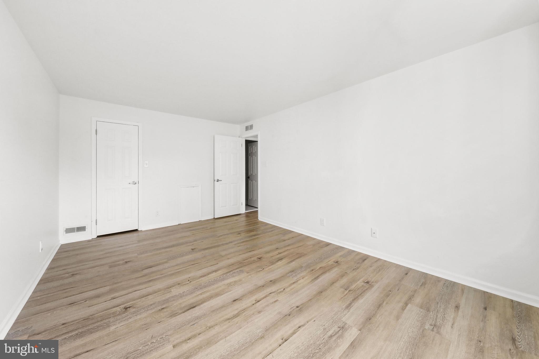 4204 Fenwick Lane Mount Laurel, NJ 08054 - Photo 13 of 27 a view of an empty room with wooden floor