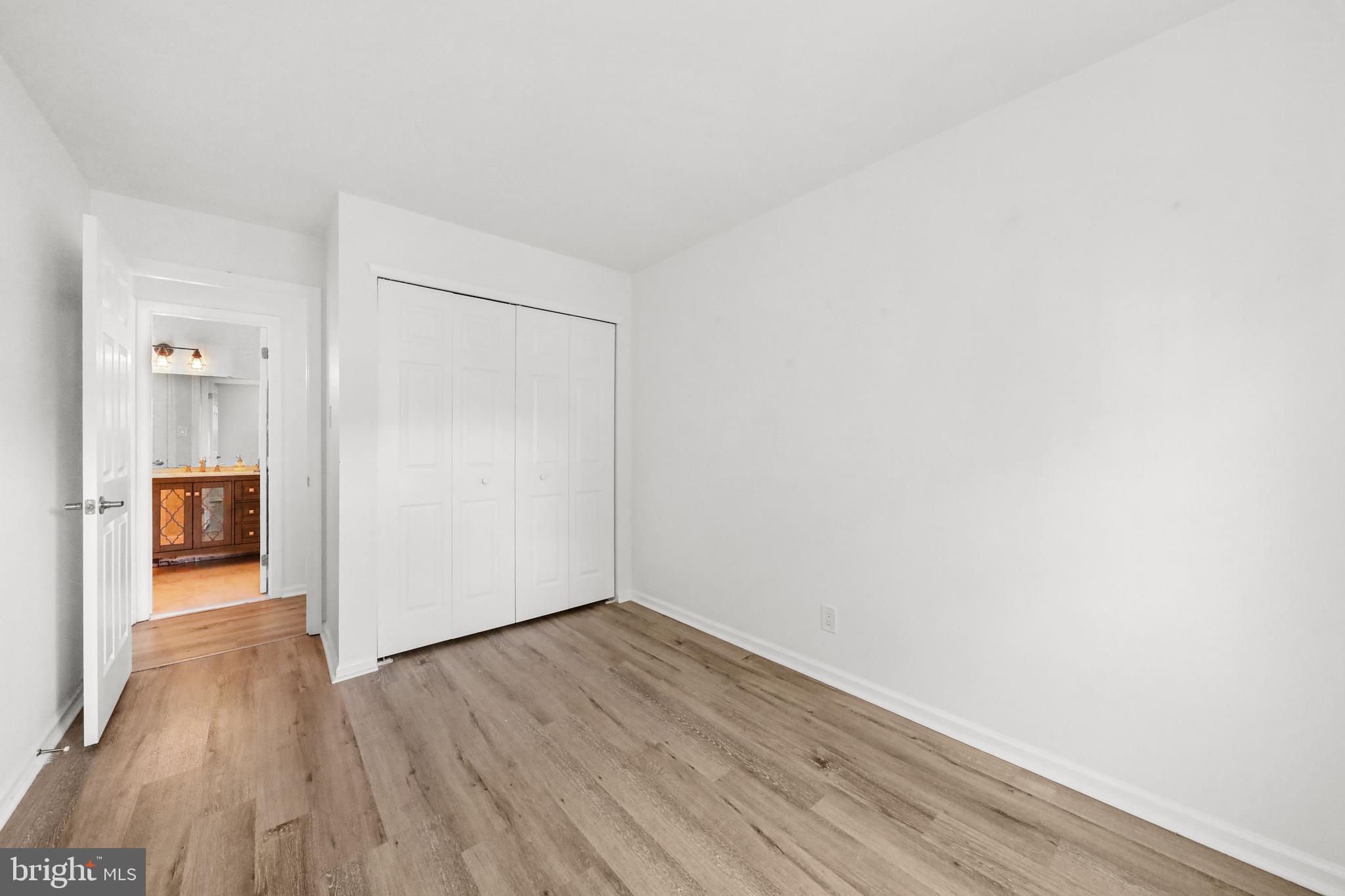 4204 Fenwick Lane Mount Laurel, NJ 08054 - Photo 17 of 27 a view of a hallway with wooden floor