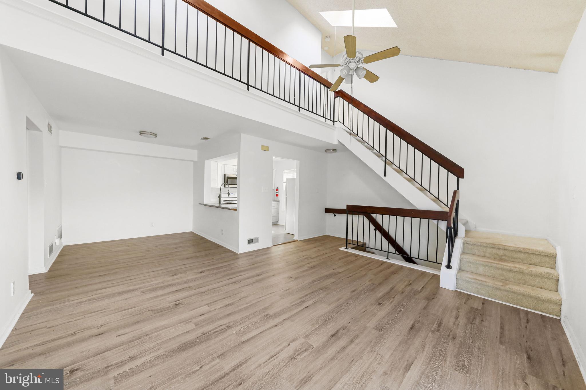 4204 Fenwick Lane Mount Laurel, NJ 08054 - Photo 4 of 27 a view of staircase with white walls and a window
