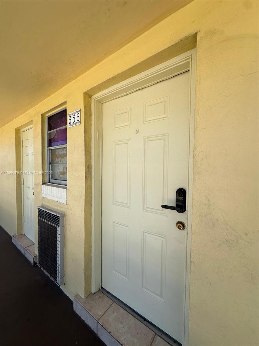20201 Northeast 29th Court, Unit D335 Aventura, FL 33180 - Photo 11 of 12 a bathroom with a shower