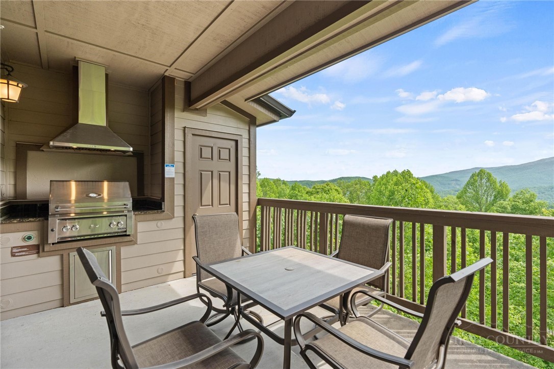 142 Evening View Lane, Unit CA3 Boone, NC 28607 - Photo 15 of 41 a view of a balcony with furniture