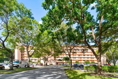 a view of a walk in closet and bedroom