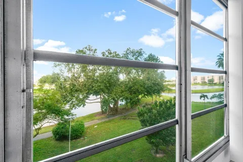 a view of a bedroom with washer and dryer
