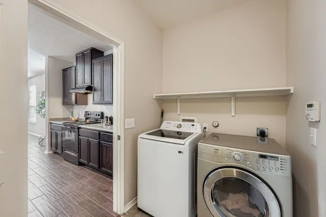 a view of kitchen and washer and dryer