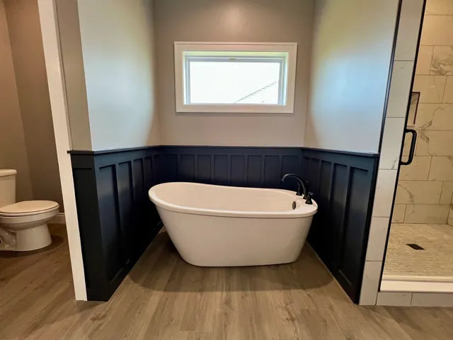 a bathroom with a sink and a toilet