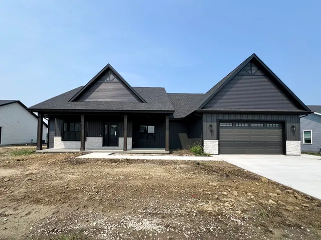 a house with yard in front of it