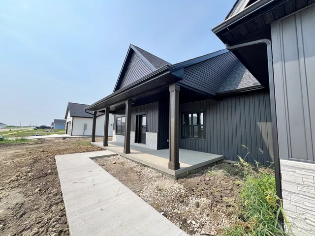 a front view of house with yard