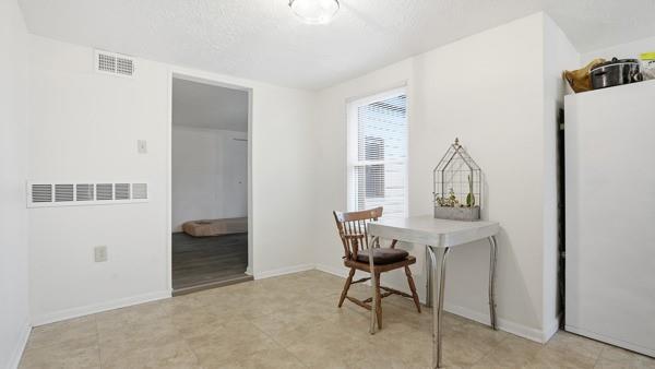 1311 Bingham Street Pittsburgh, PA 15203 - Photo 18 of 25 a view of a workspace with furniture and a window