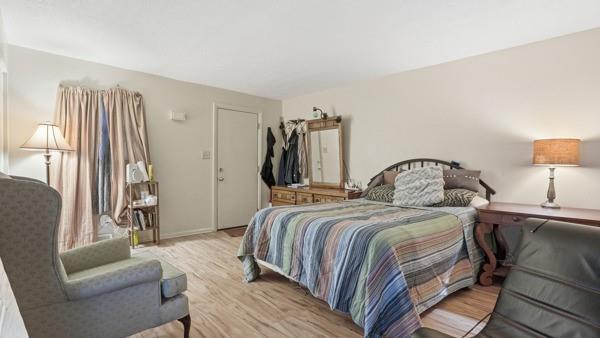 1311 Bingham Street Pittsburgh, PA 15203 - Photo 9 of 25 a bedroom with a bed and a couch